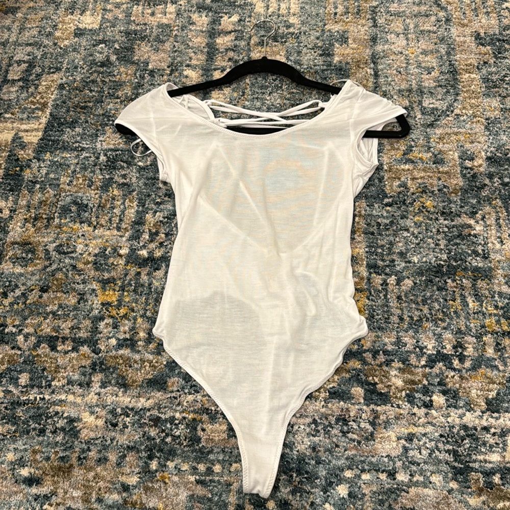 Free people tie back bodysuit never worn size XS
